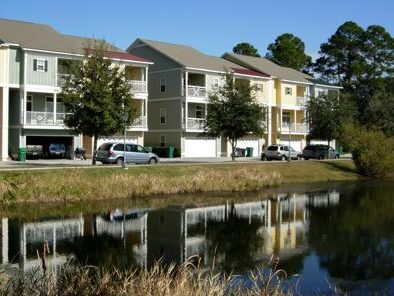Two story condo over garage and pond